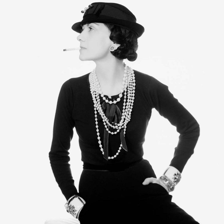 iconic coco chanel wearing pearl strand